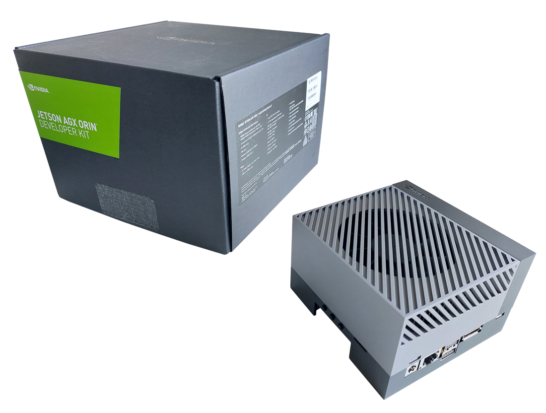 NVIDIA Jetson AGX Orin developer kit — a compact finned-silver edge AI computer beside its packaging